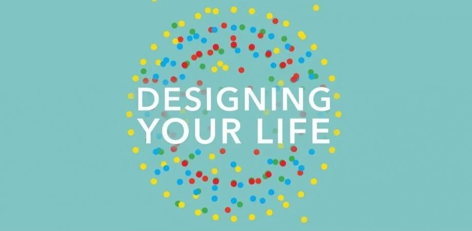 DESIGNING YOUR LIFEのロゴとカラフルなドット